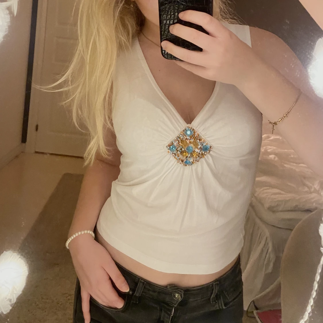 Topp med detaljer - 90