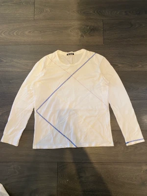 Issey Miyake - Issey Miyake Longsleeve ss10  Super rare and abstract longsleeve  shirt from issey miyake.  The colorful stitching across the shirt makes a unique and rare design.  condition: 9,7/10  if u would like more pictures or measurements just hit me up!   size: M