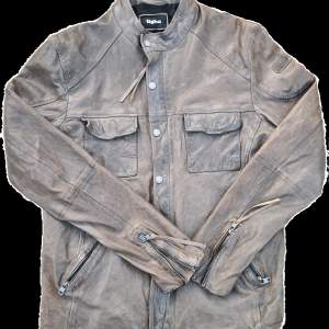 Brown/Grey sheep leather jacket from Tigha in great condition. Arms are slightly slimmed. Size XL
