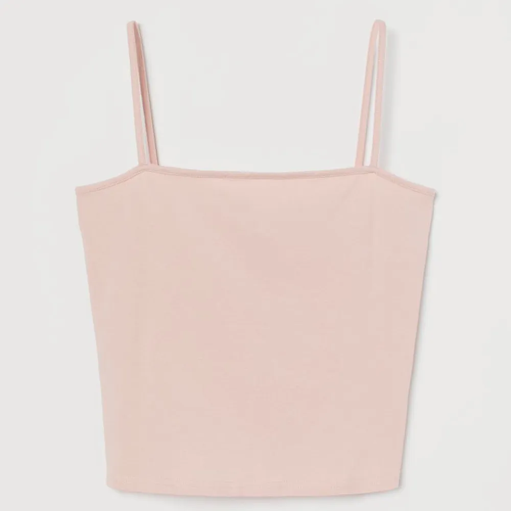 Detta är ett ljus rosa linne från H&M 30kr+frakt . Toppar.