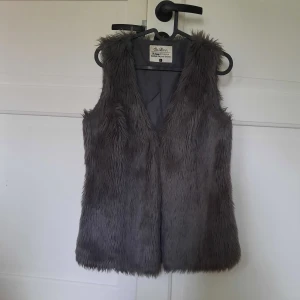Fur vest  - It is in very good condition