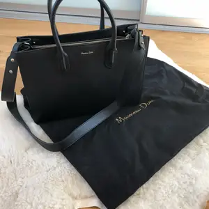 Massimo Dutti bag for sale only used twice. Minimal scratches, tag is still in the bag. Has adjustable crossbody strap.