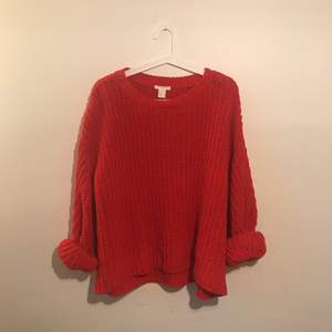 Super soft red pullover. I wear a small, looked fine on except for the sleeves which were a bit thick to put under a jacket. The bottom just covered my butt to give you an idea of the size. Still has the tag on. 