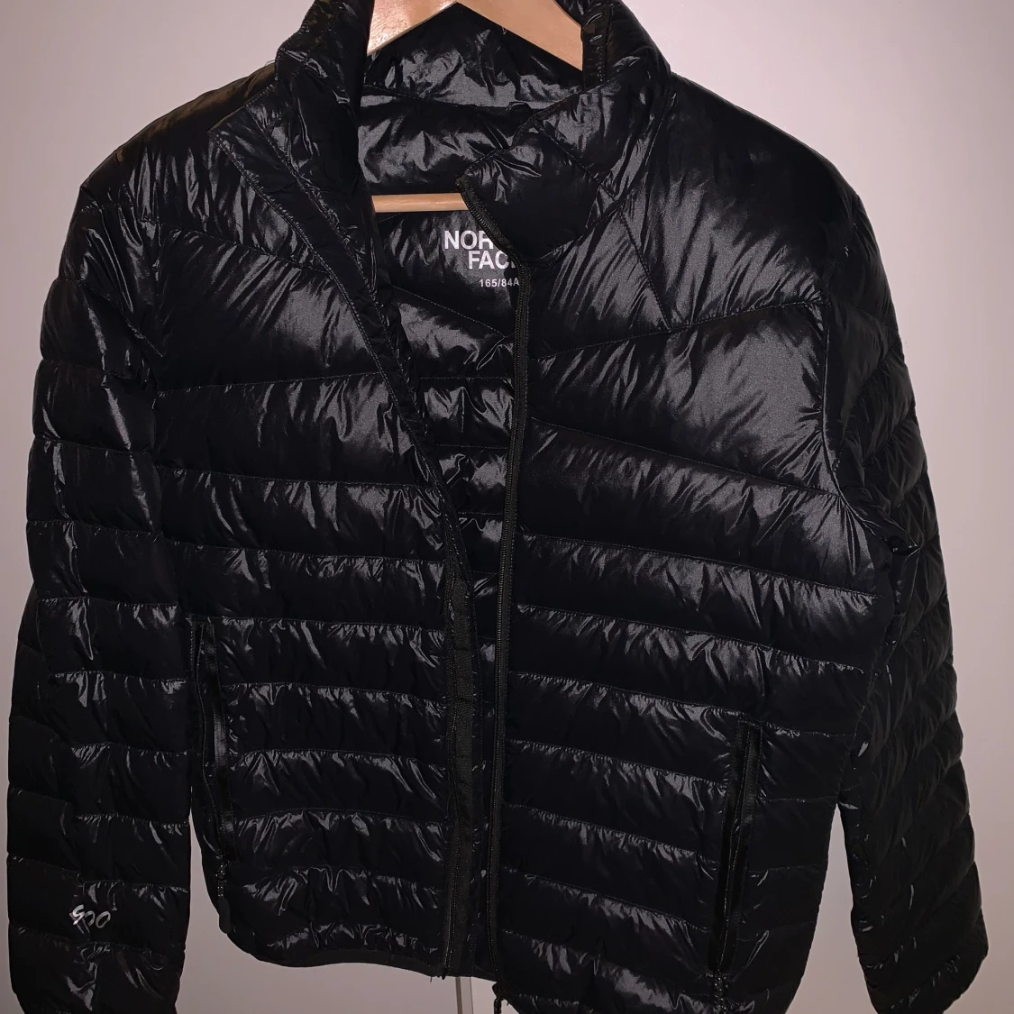 The North Face tunn jacka