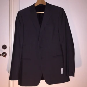  - Kostym Miu Miu. Mörkgrå. 2-delad. Byxor 50.