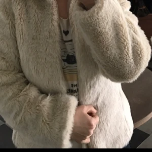  - Faux fur jacket in very good condition. Small size 