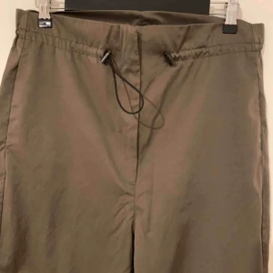  - Paper bag style pants 