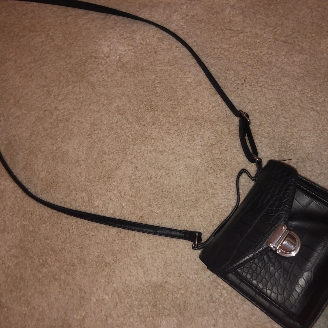 Liten hand/axel väska