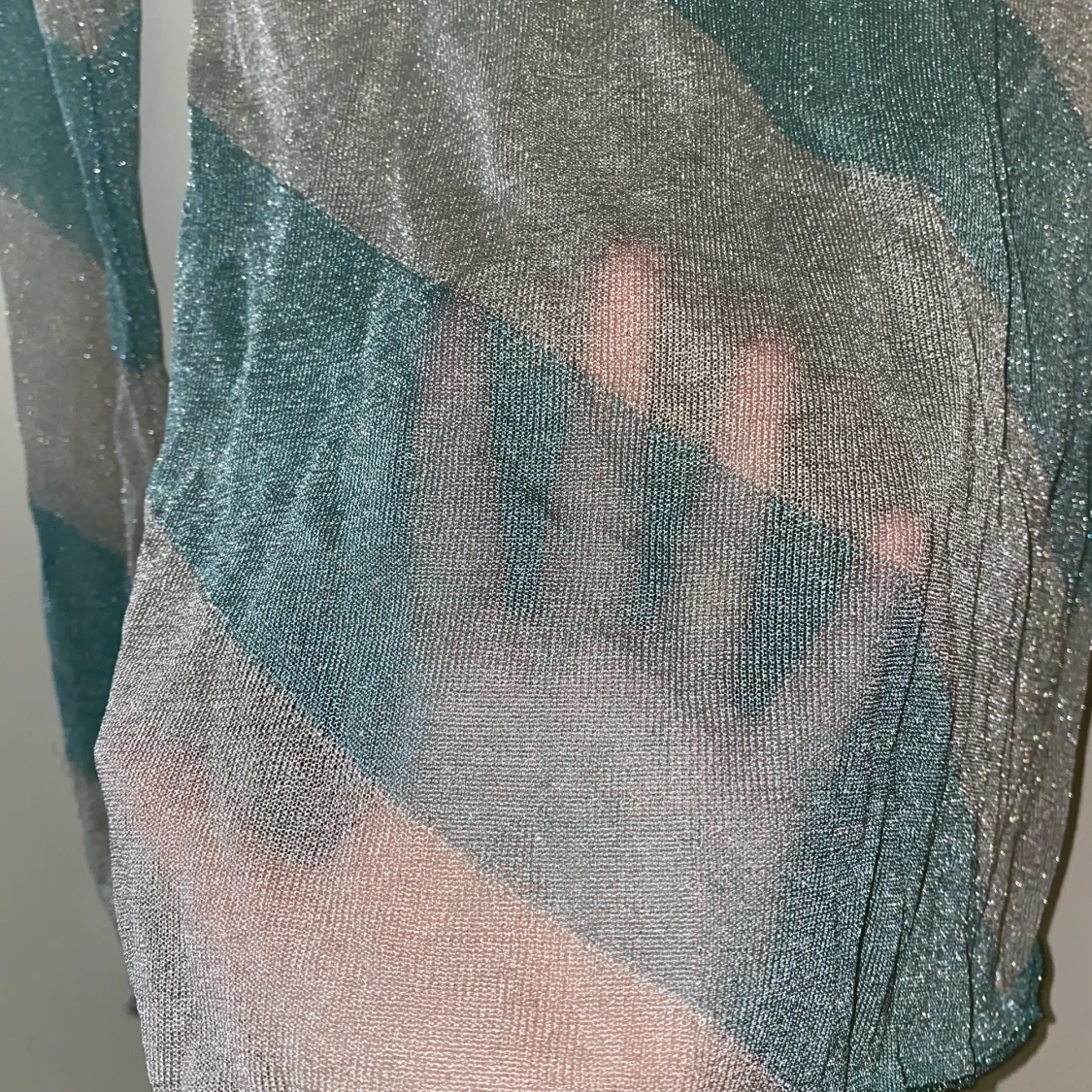 Genomskinlig tröja med glitter strl s - 90