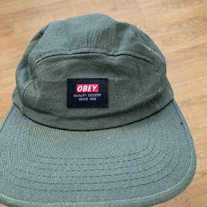  - Grön spännbar keps från obey. Frakt 60kr