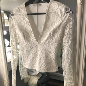  - Croppad spetstopp från Nelly i storlek XS, 99kr frakt inräknad