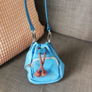 Bimba y lola crossbody bag  - Very cute crossbody nylon bag from Bimba y lola. Bought in Madrid. Phone and wallet can fit. Size height 16cm, length 18cm. Strap s length 93cm. Never used