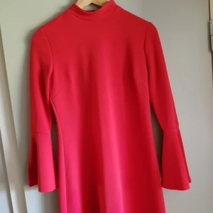  - Dress with trumpet sleeves, 100 sek + shipping, or meetup in Uppsala