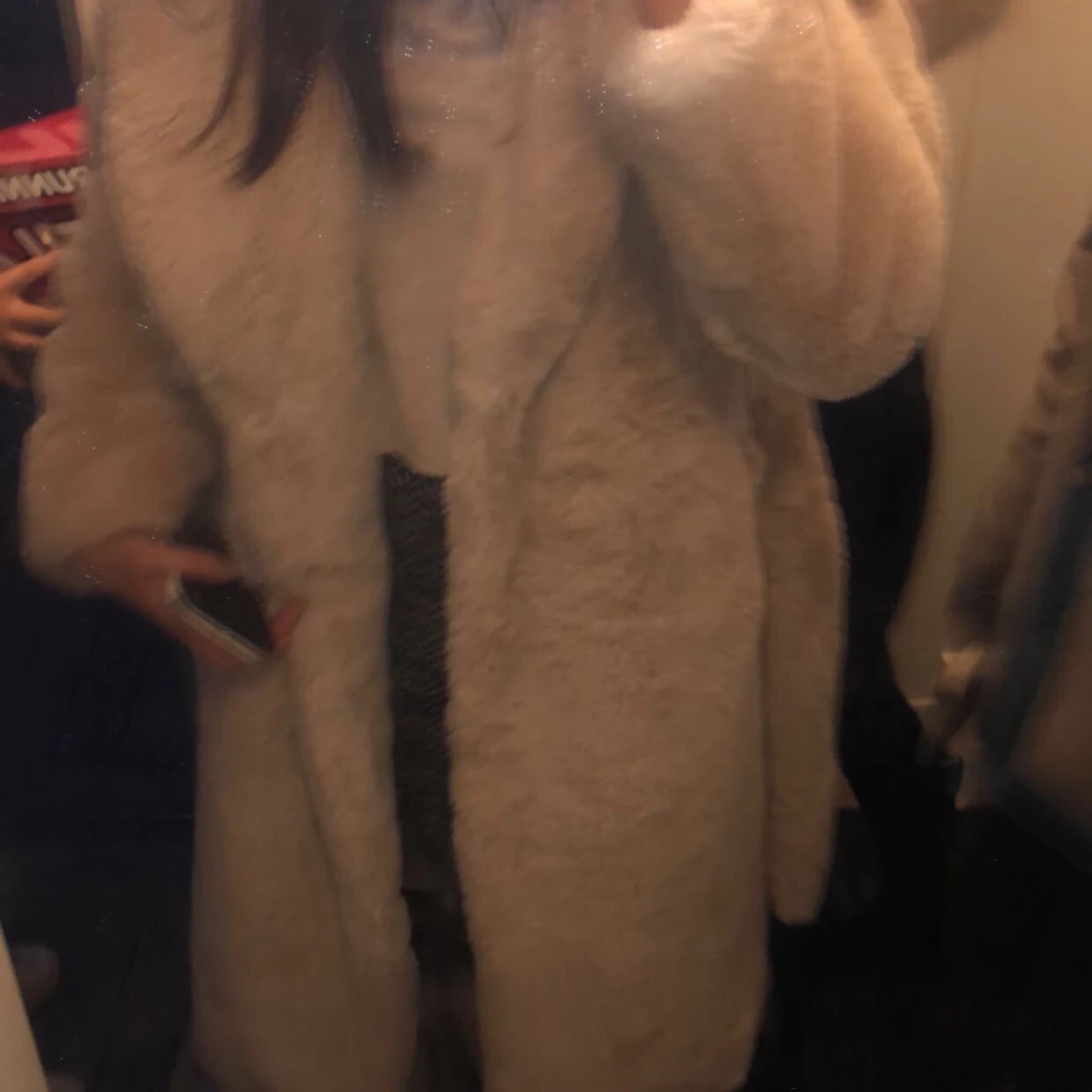 Lång fakepälsjacka från NAKD