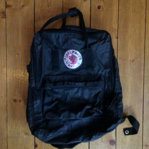 Well-loved black Kånken-backbag that has time to move into a new home!