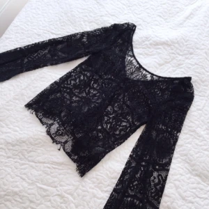  - Fin spetstop i svart 