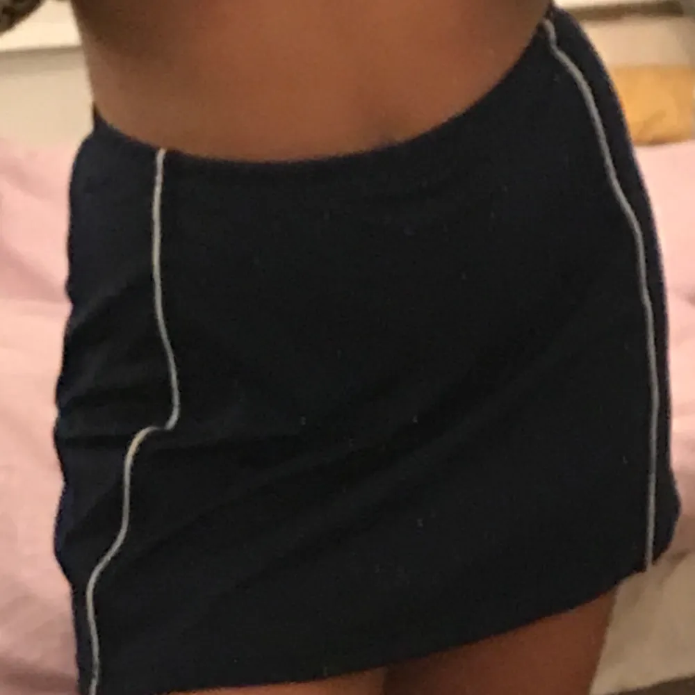 Dark blue skirt with built in shorts ✌️, white strips, super comfy, great for sports, good length about mid thigh, original 400kr 😶, bought in England! . Kjolar.