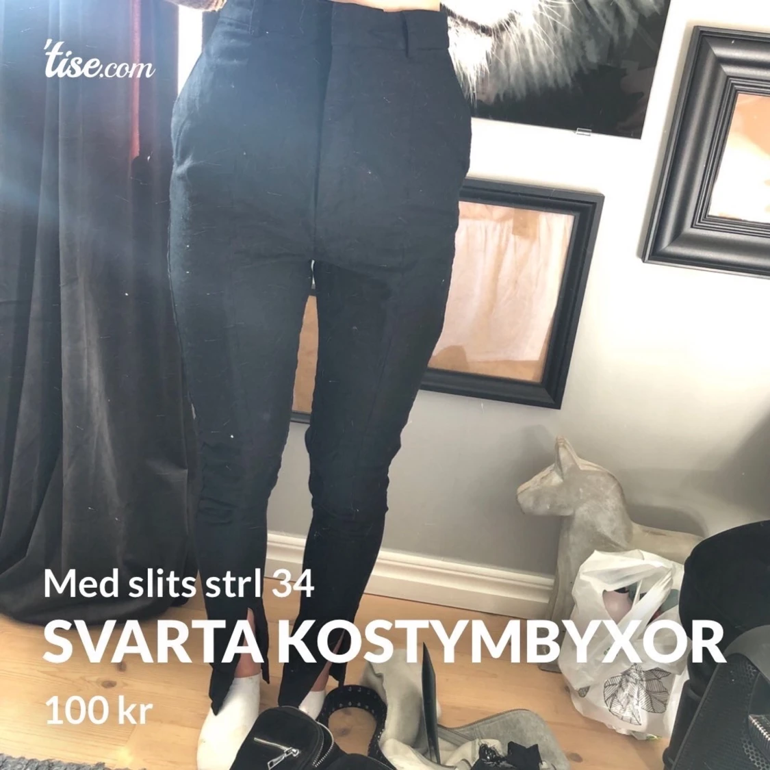 Svarta kostymbyxor med slits strl 34
