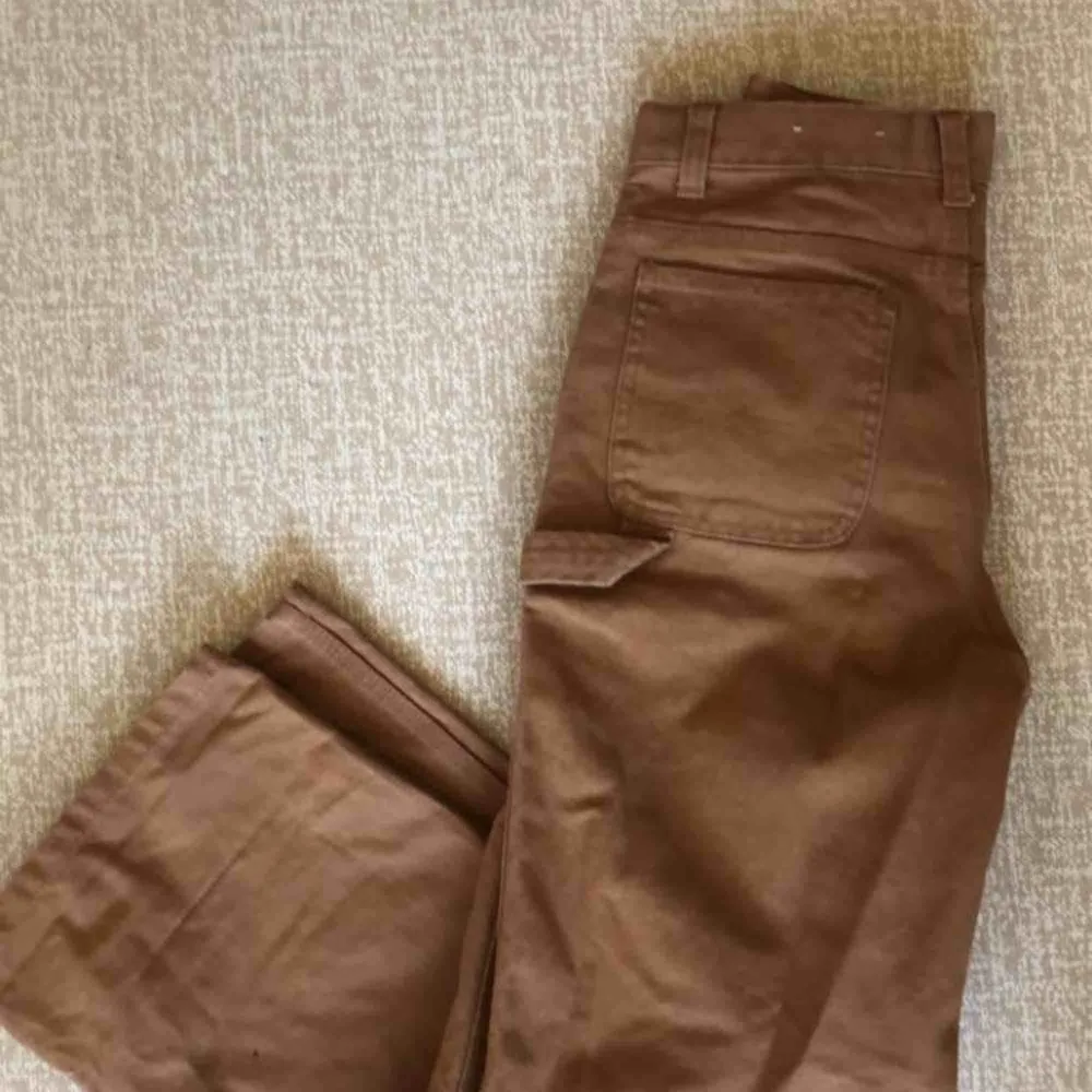 Ljusbruna carhartt work pant . Jeans & Byxor.