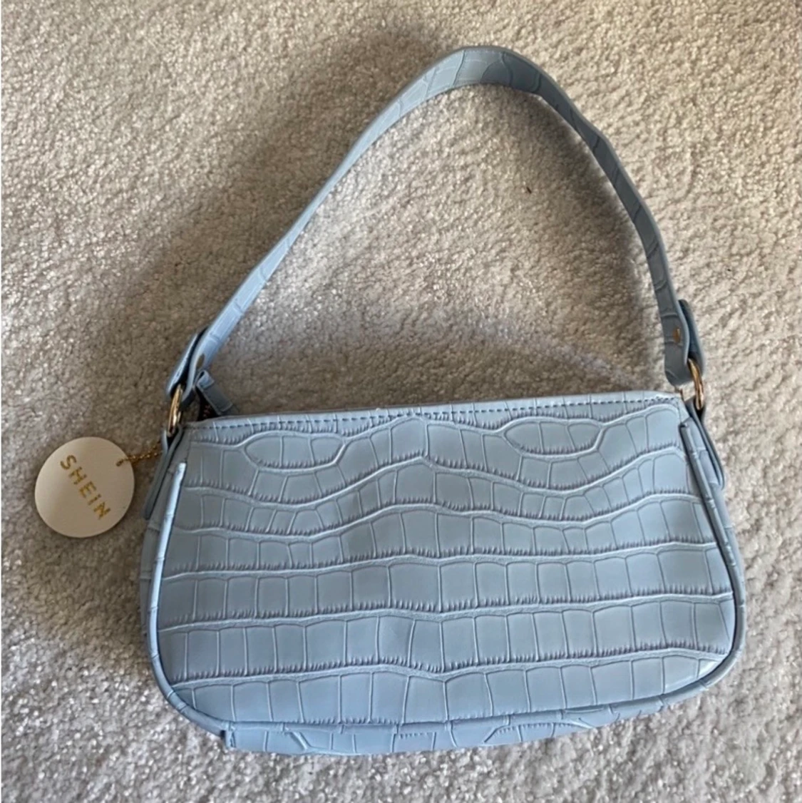 Ljusblå väska - 90