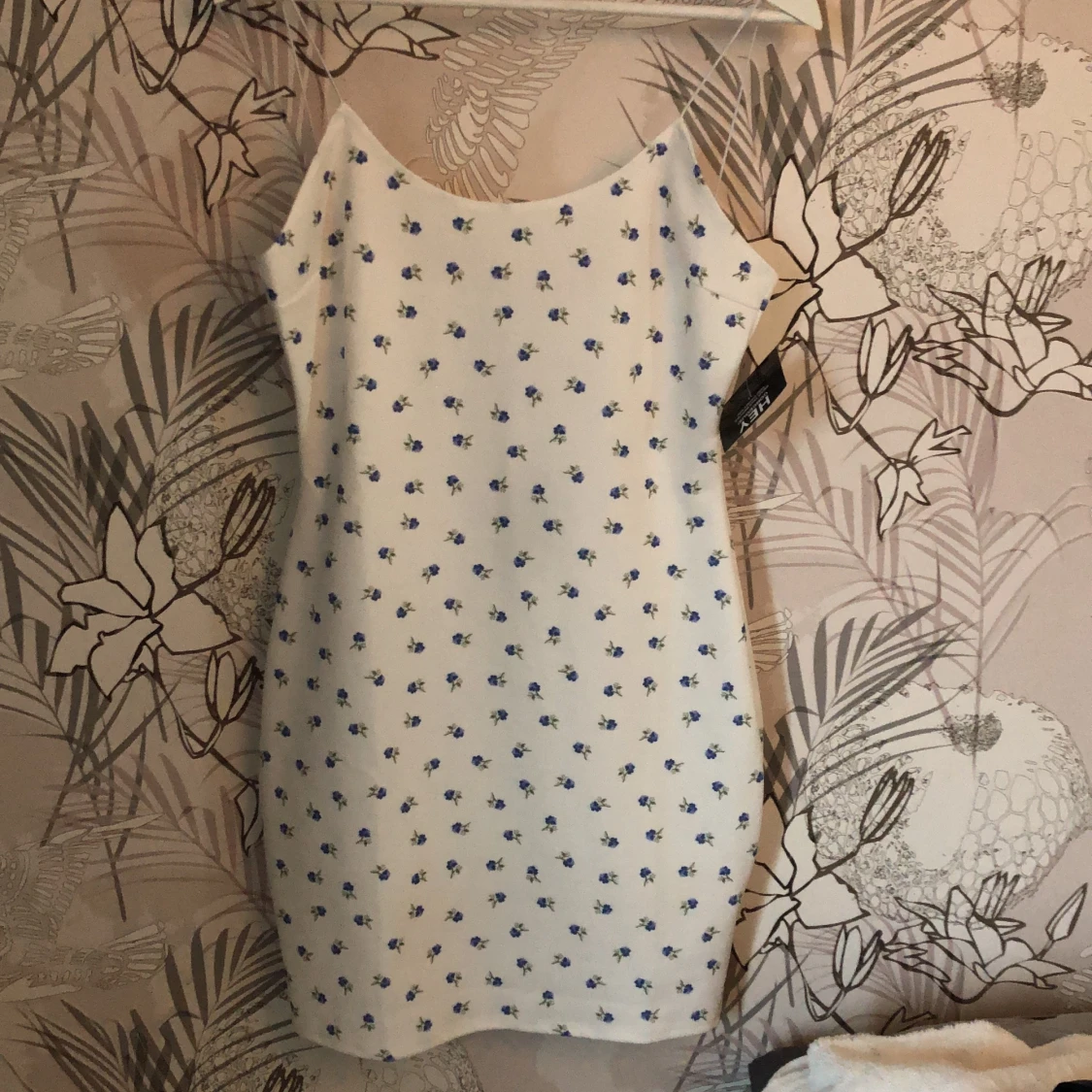 Blommig klänning från Nelly.com