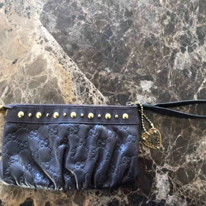  - Gucci clutch vintage  Nypris ca 7000