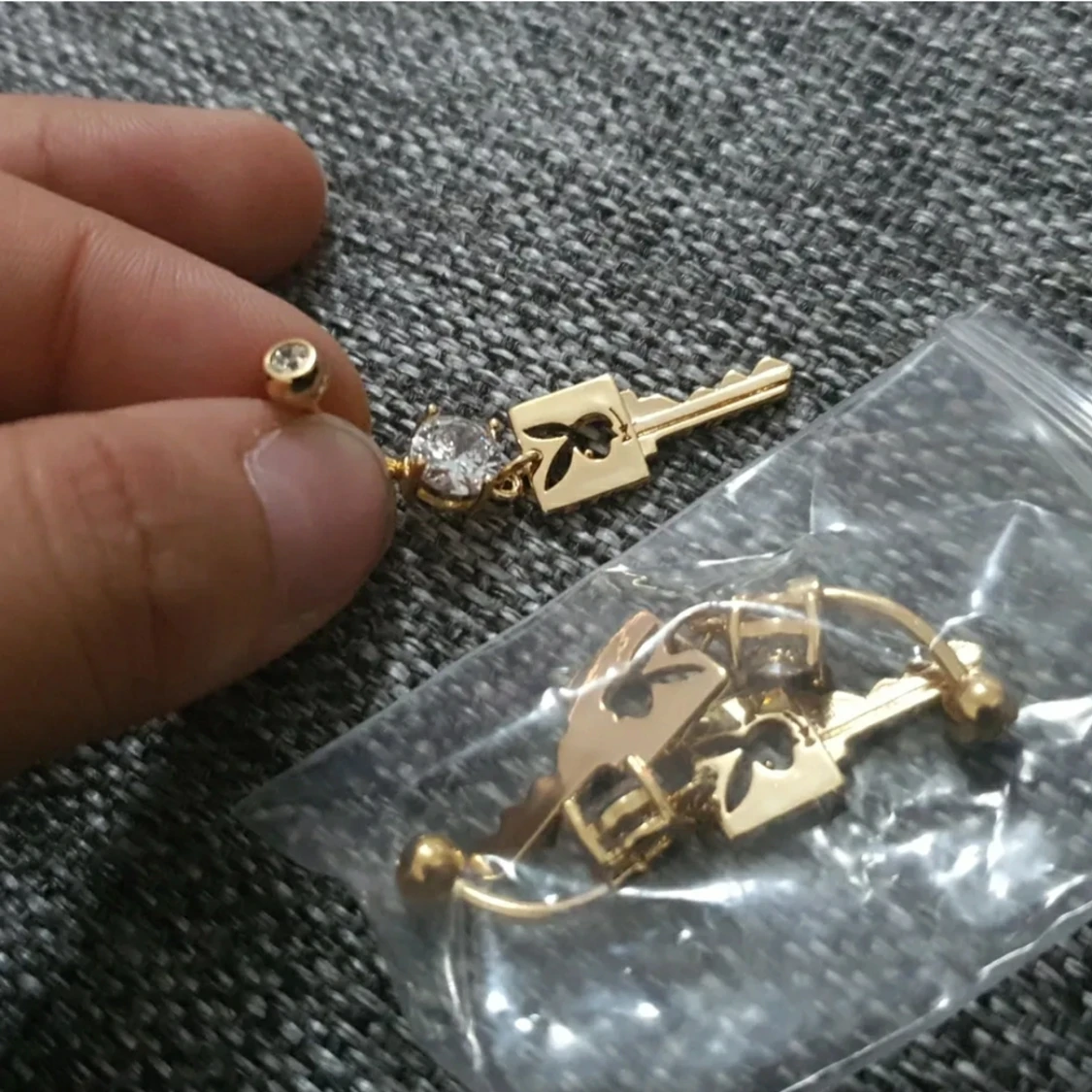 Playboy nyckel guldpiercing - 90