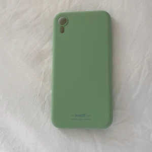 Holdit mobilskal för iPhone xr - Ett grönt holdit mobilskal för iPhone XR. Pris 75 kr+frakt