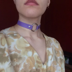  - A purple choker. Never used. 