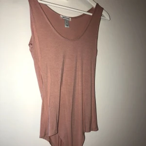  - Rosa body från Nelly Köparen står för frakten😃