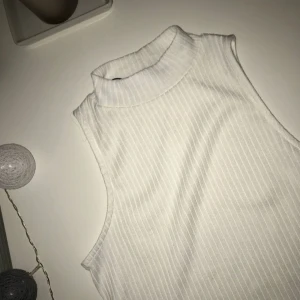  - Tanktopp med polo från Lager 157. Aldrig använd. Köpare står för frakt.