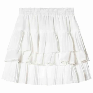  - Söt volangkjol från Little Remix som passar xxs-s, (strl 12 barn). Använd endast en gång då den var lite för liten. (Frakt tillkommer). Nypris 894 kronor!