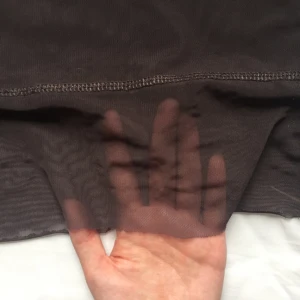  - Brun polotröja i brun/grå mesh från weekday!