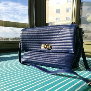  - a very elegant blue bag, used two or three times