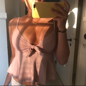 Rosa topp - Rosa topp som tyvärr inte används.