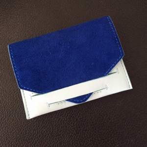 Beautiful pale blue and blue suede and leather card holder from &other stories. 