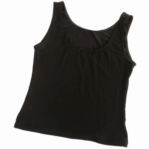  - Svart linne som är något kortare. Liten rosett framtill. Perfekt basplagg, mycket bra skick.