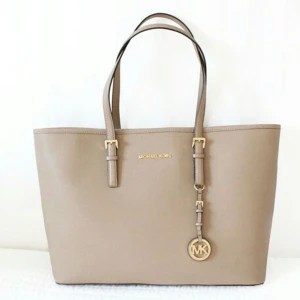  - Michael kors 
beige 
