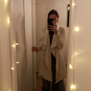 Beige kappa  - Beige. Aldrig använd 