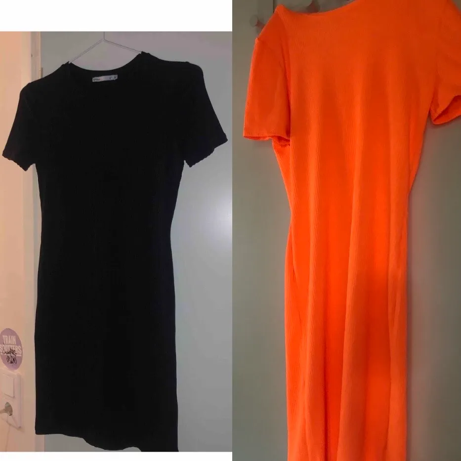 Tight svart och orange klänning. 40kr styck. Klänningar.