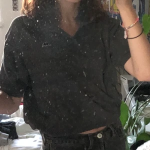 grå piké från kappa - en grå piké ifrån kappa 