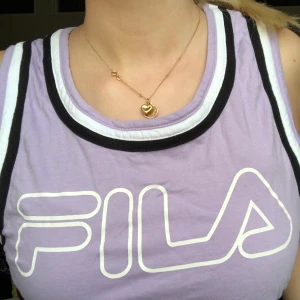FILA linne - Ljus lila fila linne. 