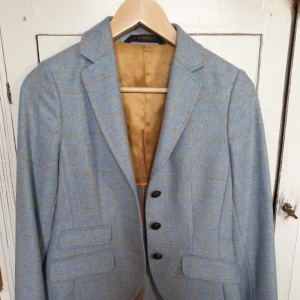  - En mkt elegant kavaj i stl 34.av märket Morris. 