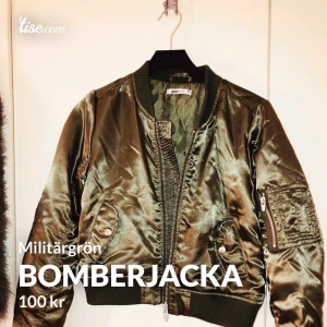 Bomberjacka militär grön - Bomberjacka aldrig använd som ny i skick. Storlek 38. Kan passa S också 