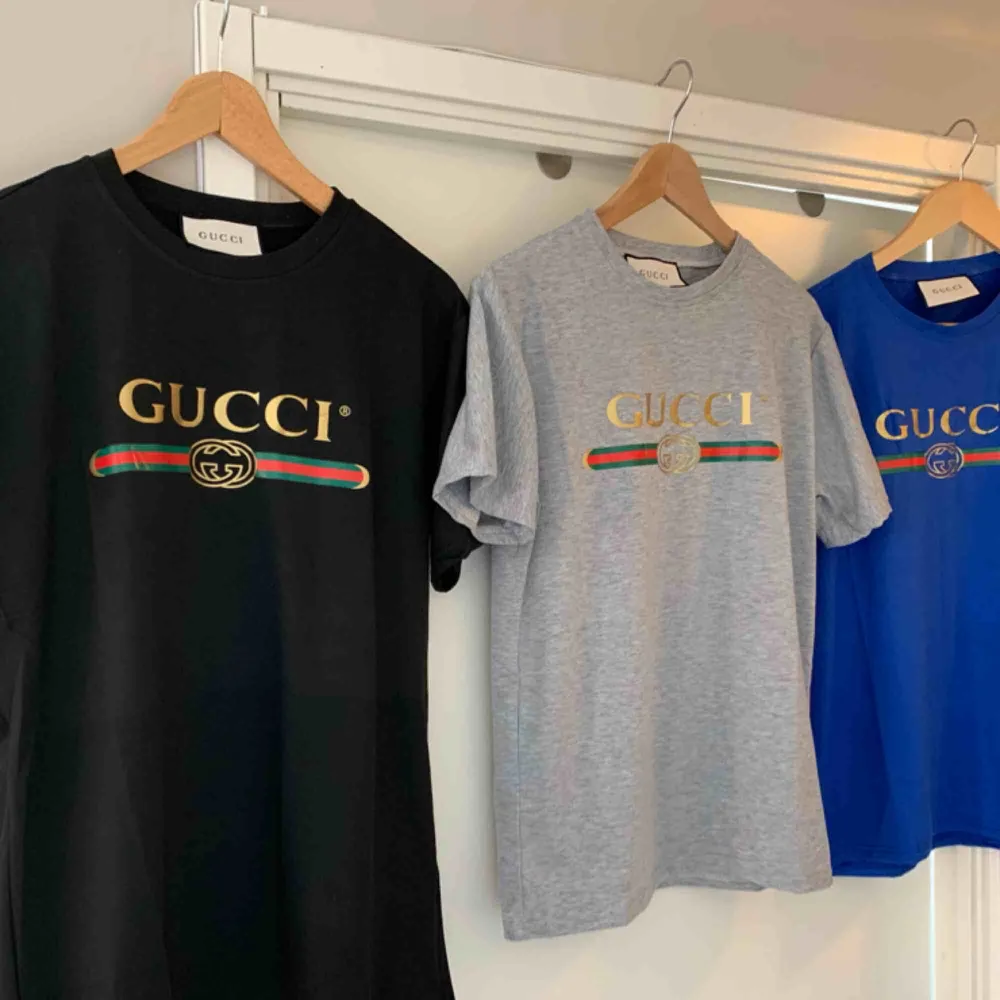Gucci T-Shirt  Fabric: 100 Percent Cotton Sleeve: Half Sleeve   Pattern: Printed   . Neck Shape: Round   . Fit: Regular Fit. T-shirts.