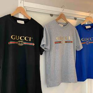 Gucci T-Shirt  Fabric: 100 Percent Cotton Sleeve: Half Sleeve   Pattern: Printed   . Neck Shape: Round   . Fit: Regular Fit