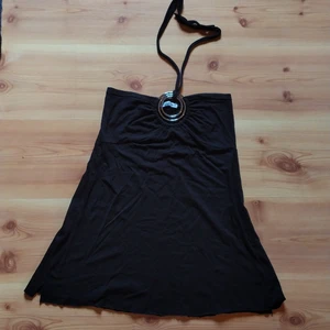 Dolce and Gabbana klännin/topp - Svart med silvrig detalj. Saknas storlekslapp men materialet är stretchigt så passar nog xs-m. 