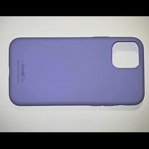 Extraglas + Skal - Ett ljus lila mobilskal från holdit och även ett extra glas, båda till iPhone X. Båda köpta för ca 150 kr/st men säljer för 100kr tillsammans i snabb affär, säljes pga köpta till fel mobil 