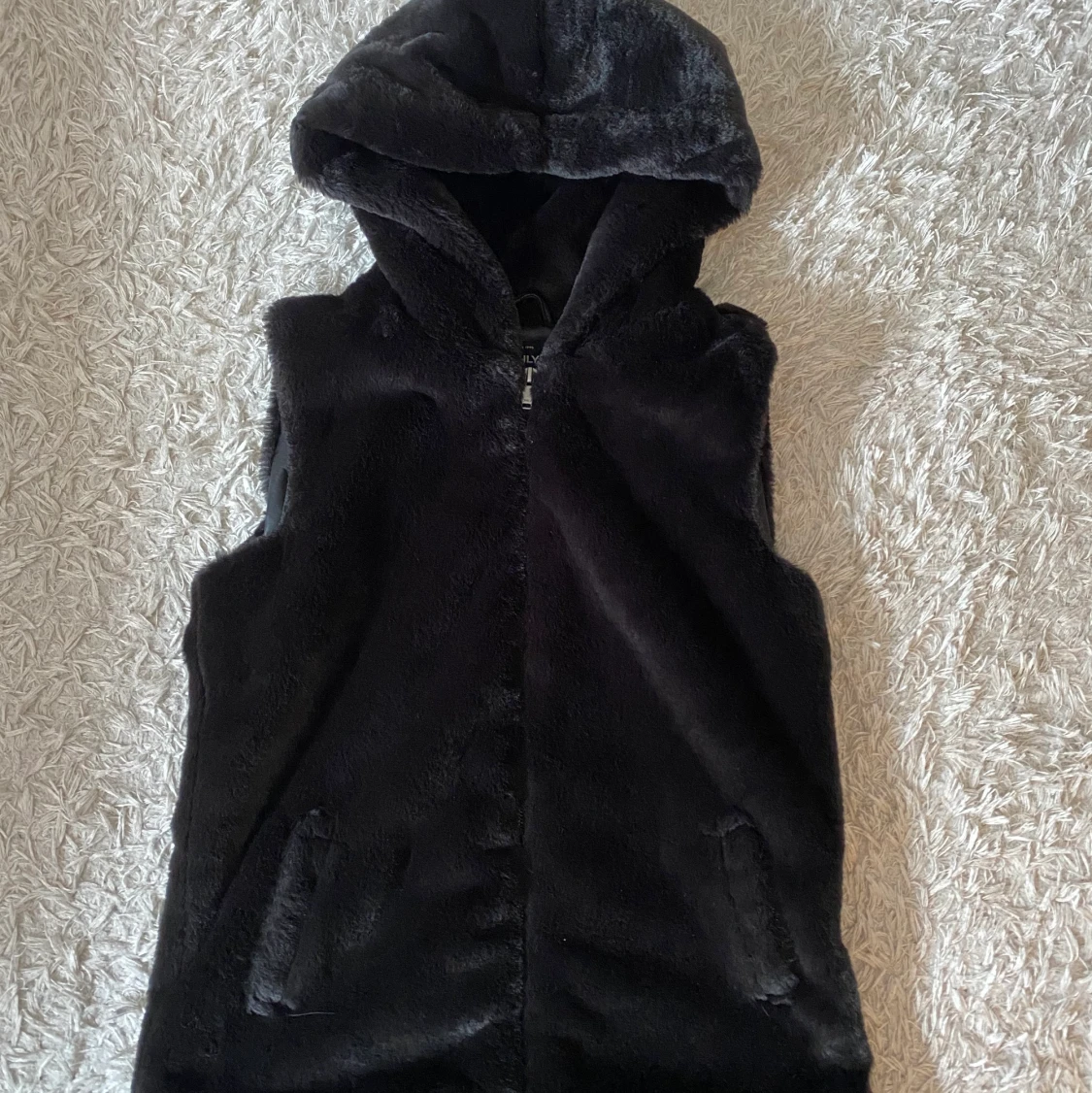 Fluffig väst - 91