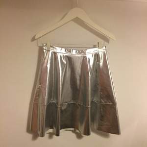 Silver, amazing fake leather skirt from Monki complete with fake suede lining. Worn a couple of times but it's too big so I have to let it go. 